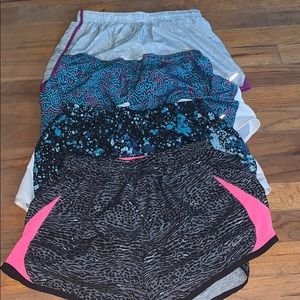 Four pairs of Nike shorts.